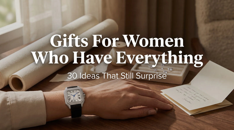 United Jewel Liora Pearl moissanite watch beside ivory ribbon and a handwritten gift note